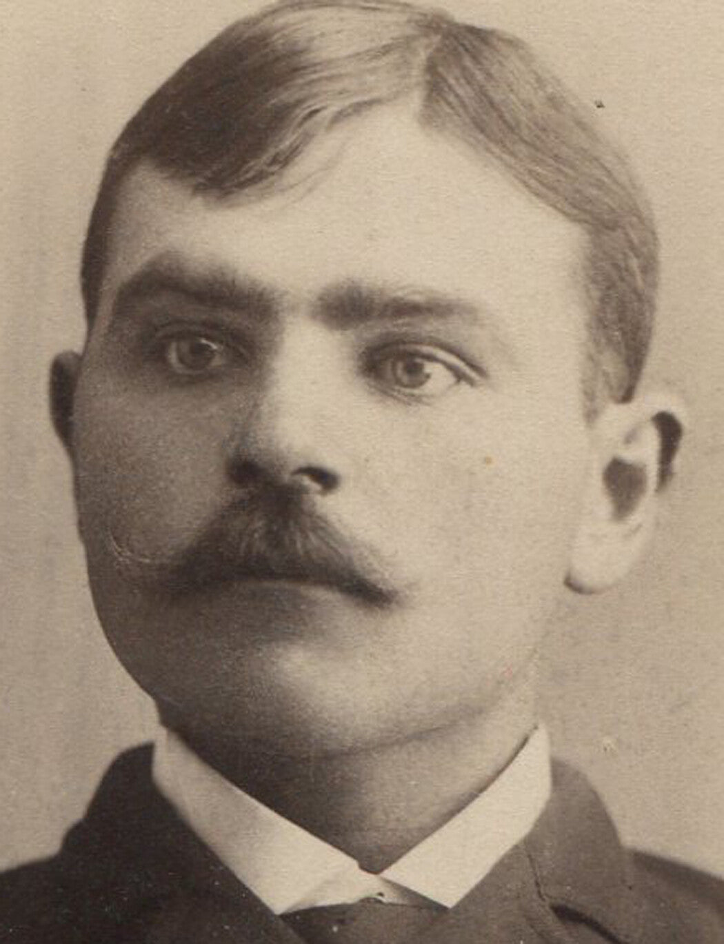MAN WHO LOOKS LIKE HE IS HALLUCINATING. CABINET CARD. MANISTIQUE, MICHIGAN.