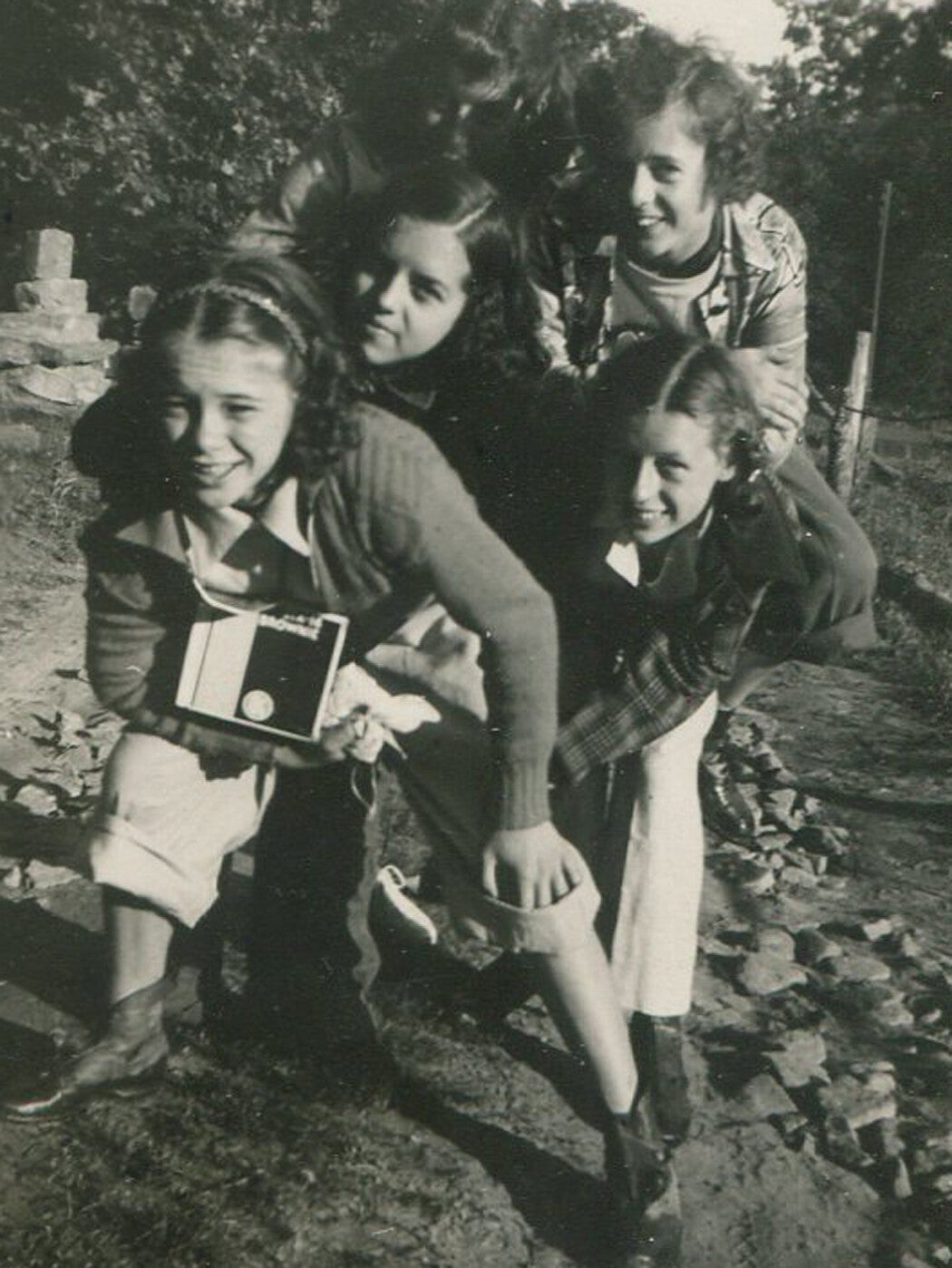 GIRLS AT SUMMER CAMP. 21 SNAP SHOTS, CIRCA 1930-50.
