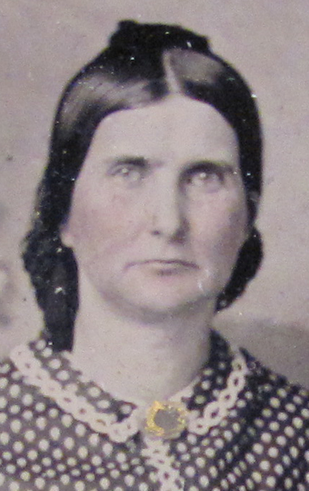 WOMAN IN POLKA DOT DRESS. CRISP TINTED TINTYPE PAINTED BACKGROUND. 6TH PLATE.