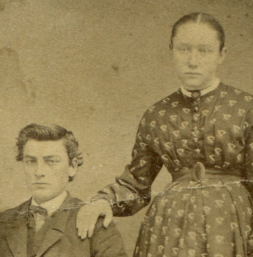WOMAN IN BOLD PRINT DRESS AND CUTE HUSBAND. AFFECTIONATE POSE. CDV.