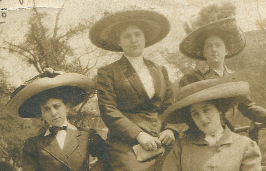 WOMEN IN HUGE, HUGE HATS. TONED SILVER PRINT. 2.5 X 3 INCHES.
