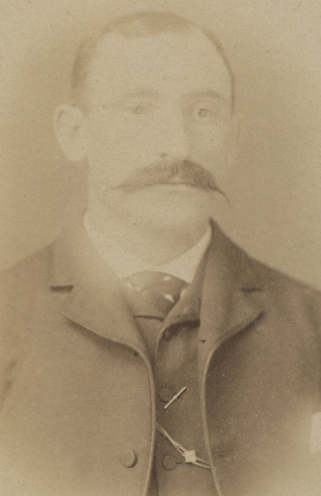 MAN WITH WAXED TIPPED MUSTACHE. CABINET CARD.