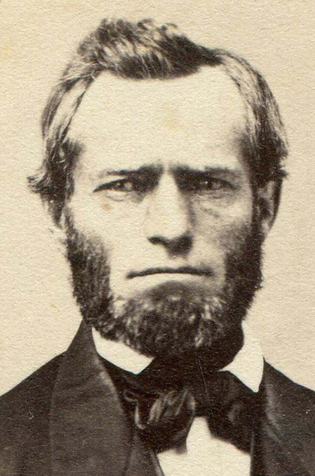 GRIM, ANGRY EXPRESSION, MAN SEATED POSE. CDV.