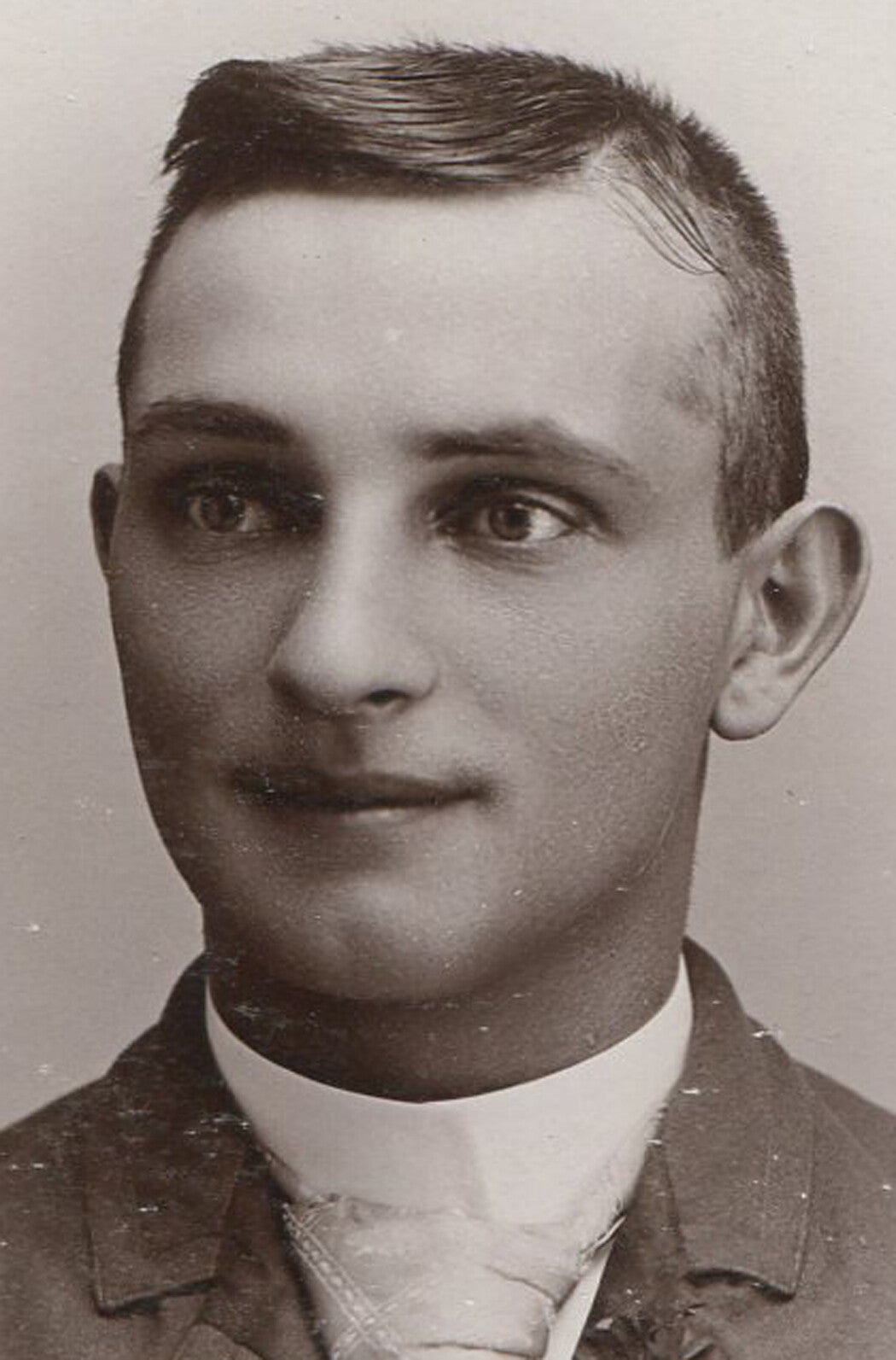 YOUNG MAN, GUILTY OF SOMETHING. CABINET CARD. STORY CITY, IOWA.