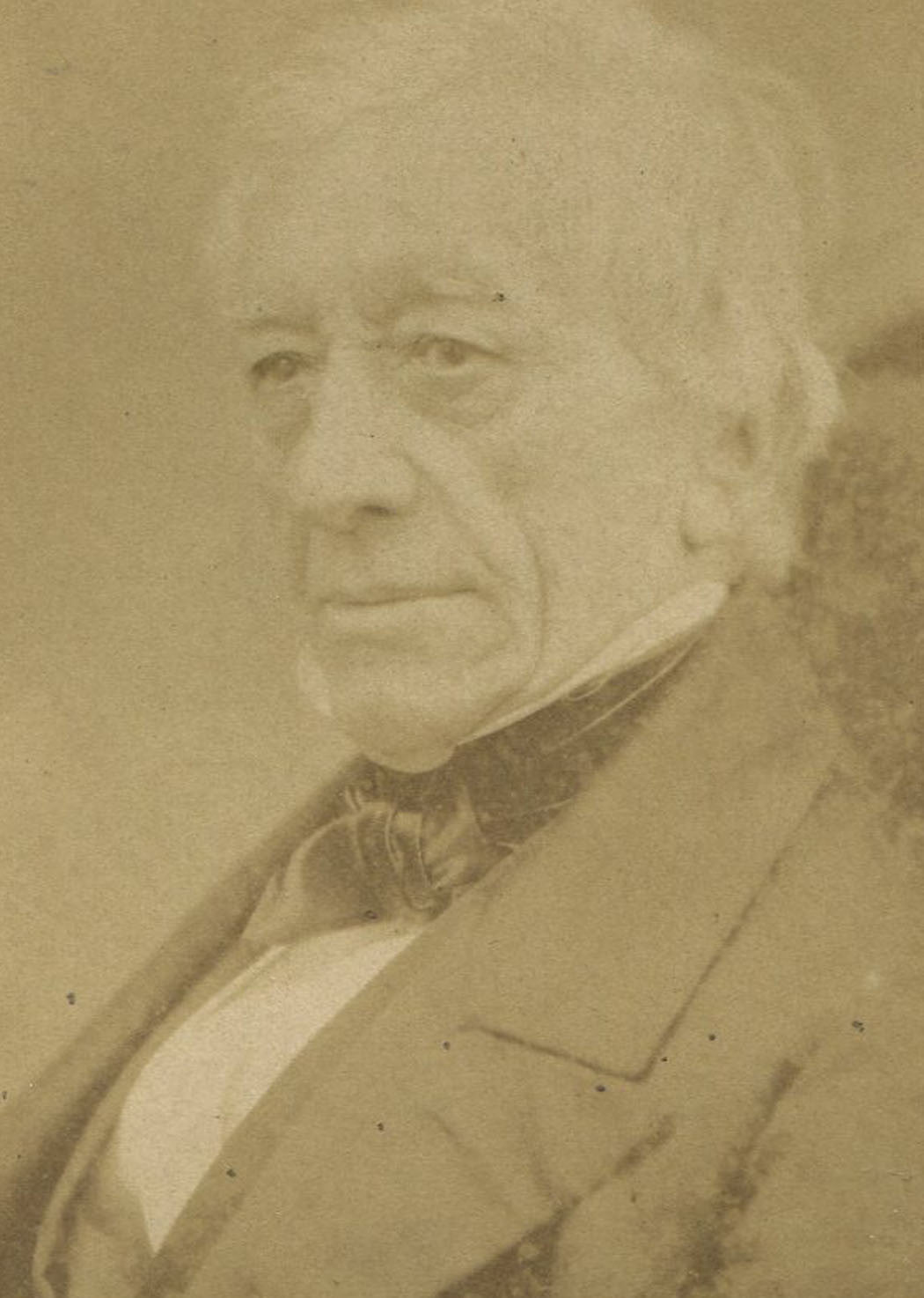 UNKNOWN MAN HOLDING PENCIL. ALBUMEN PRINT BY MAULL AND POLYBLANK.