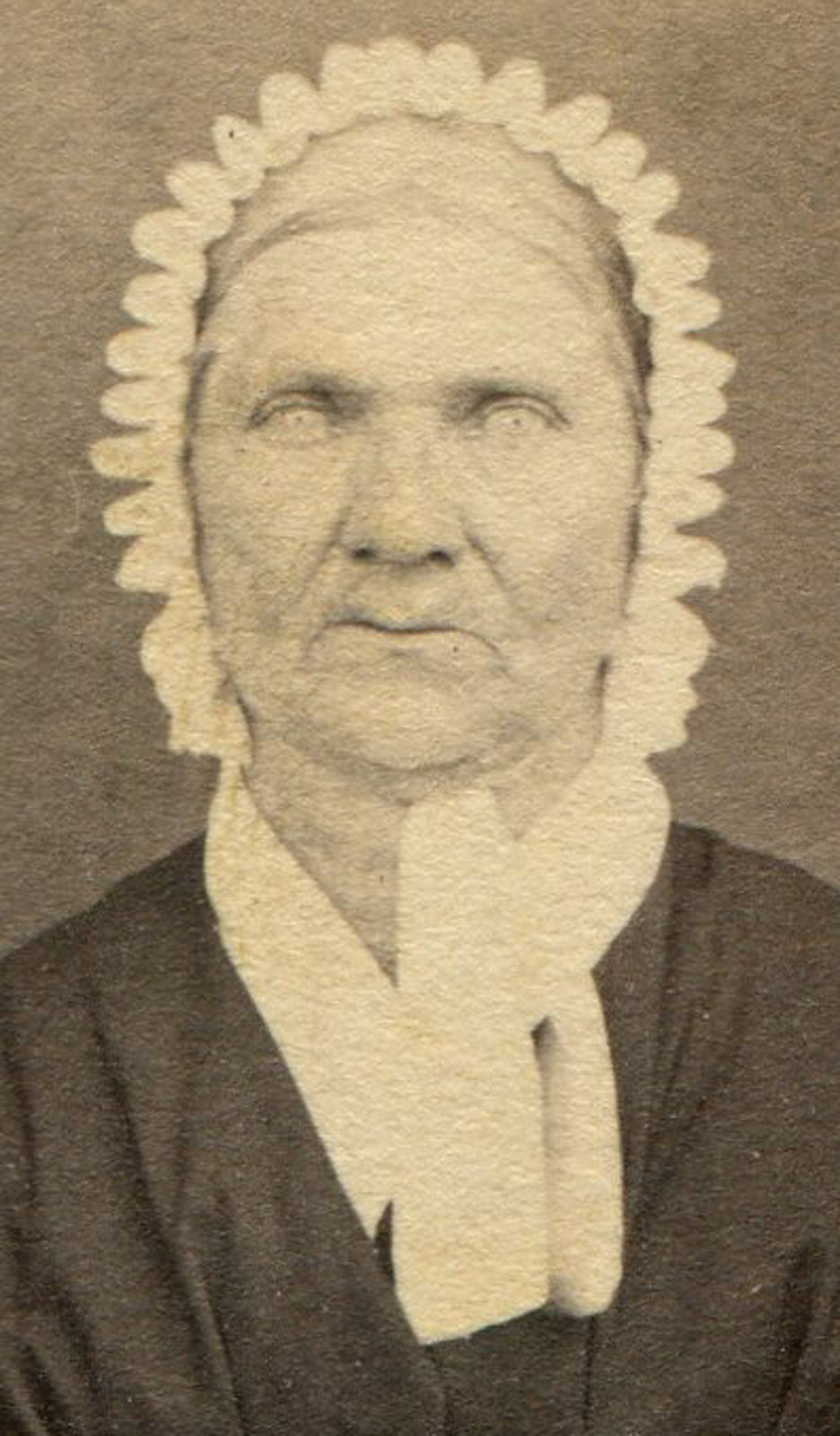 OLD WOMAN IN BONNET, HAUNTED BLANK EYES. VERY EARLY CDV.