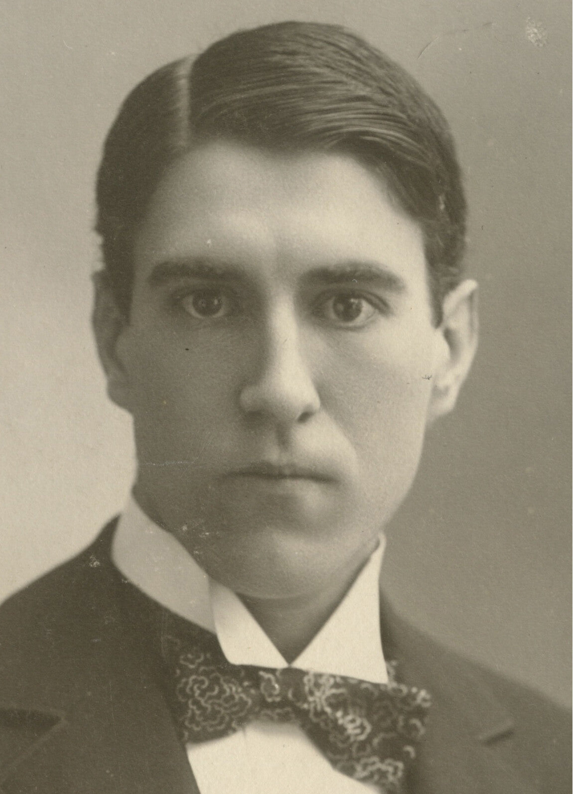 HANDSOME MAN W/ NICE SUIT, LAPEL PIN, PHOTO BY JARVIS WHITE ART CO.