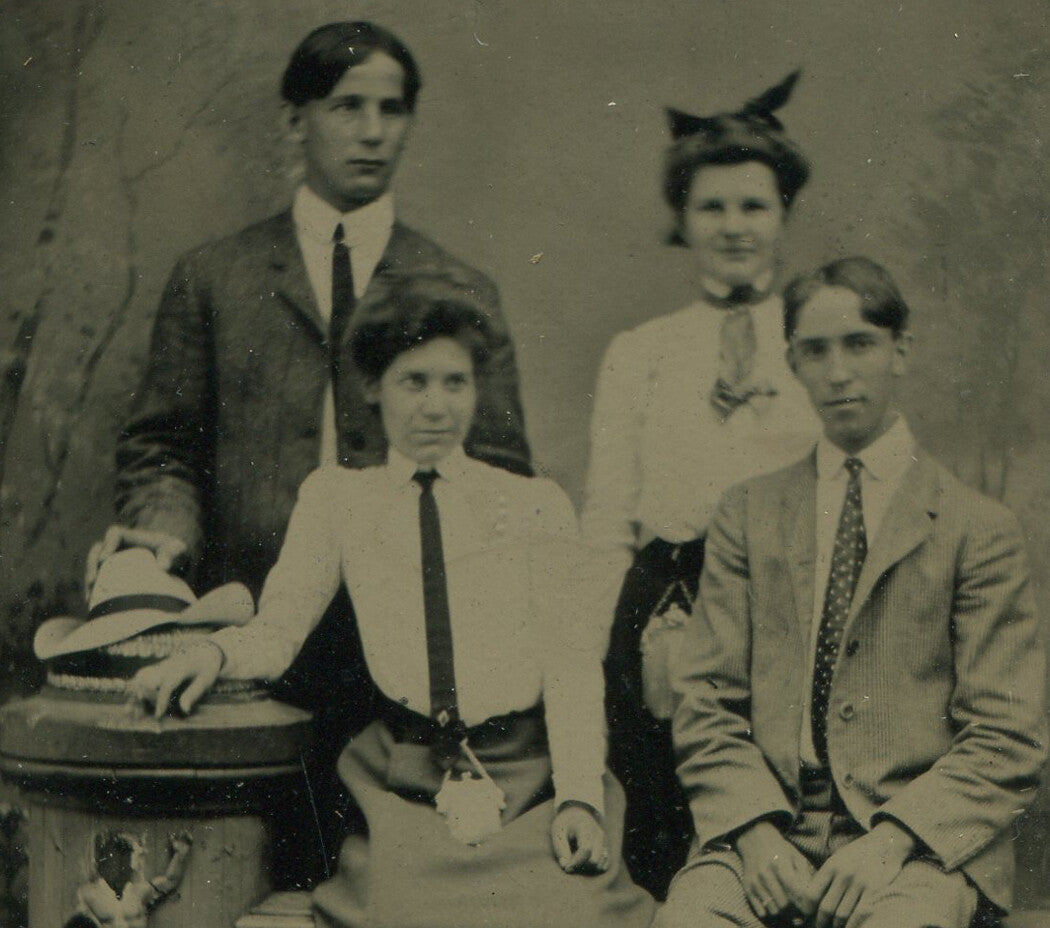 FASHION FORWARD YOUNG COUPLES. TINTYPE IN PERIOD PAPER MAT.