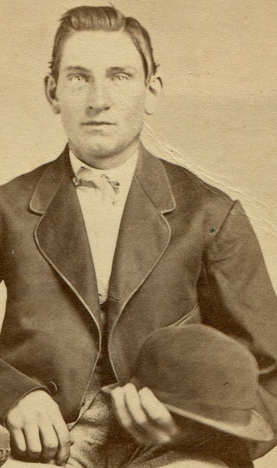 YOUNG MAN IN FORMAL POSE HOLDING BOWLER HAT. CDV. AUBURN, N.Y.