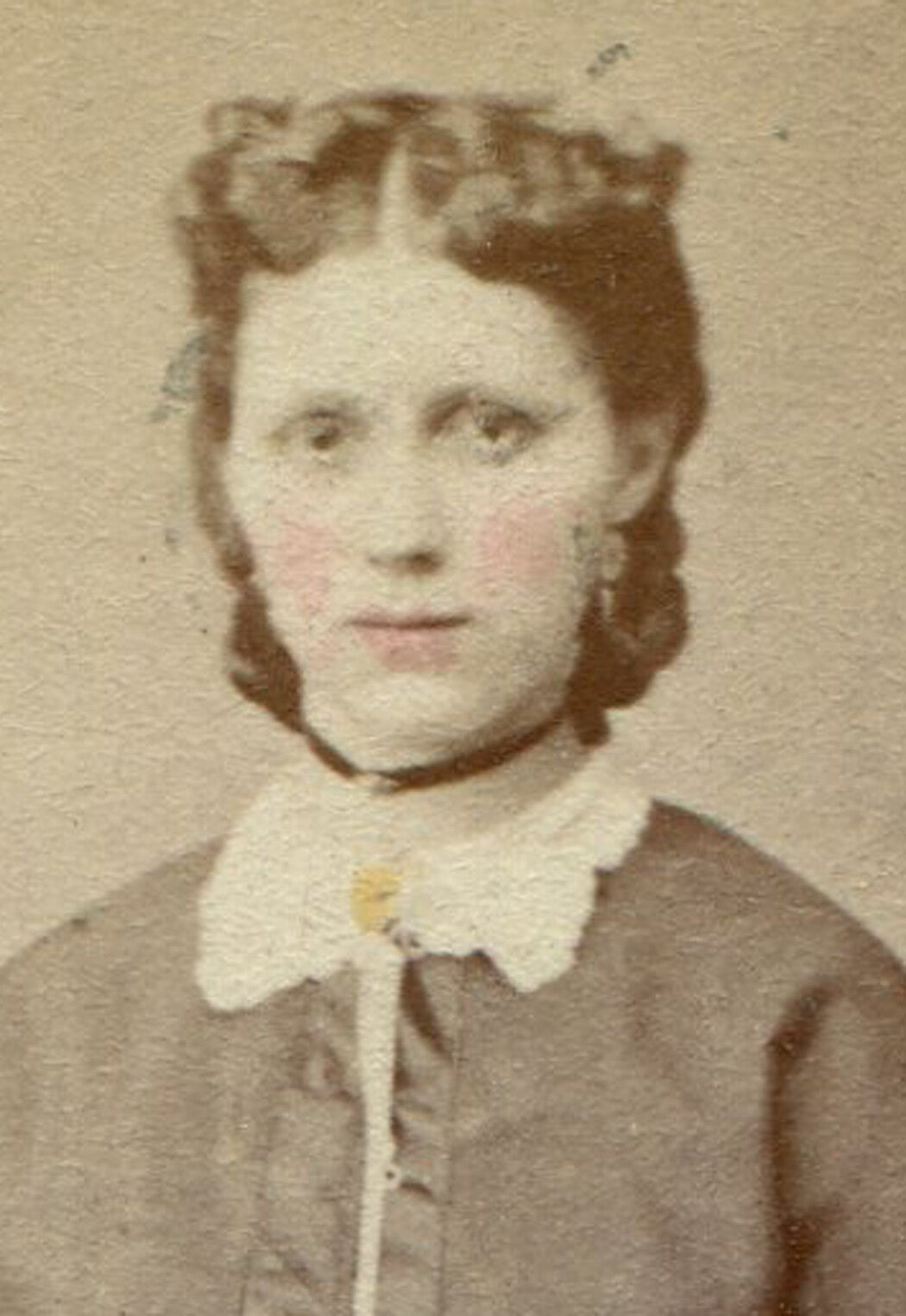 WOMAN IN SATIN TRIMMED SKIRT AND JACKET. TINTED CDV.