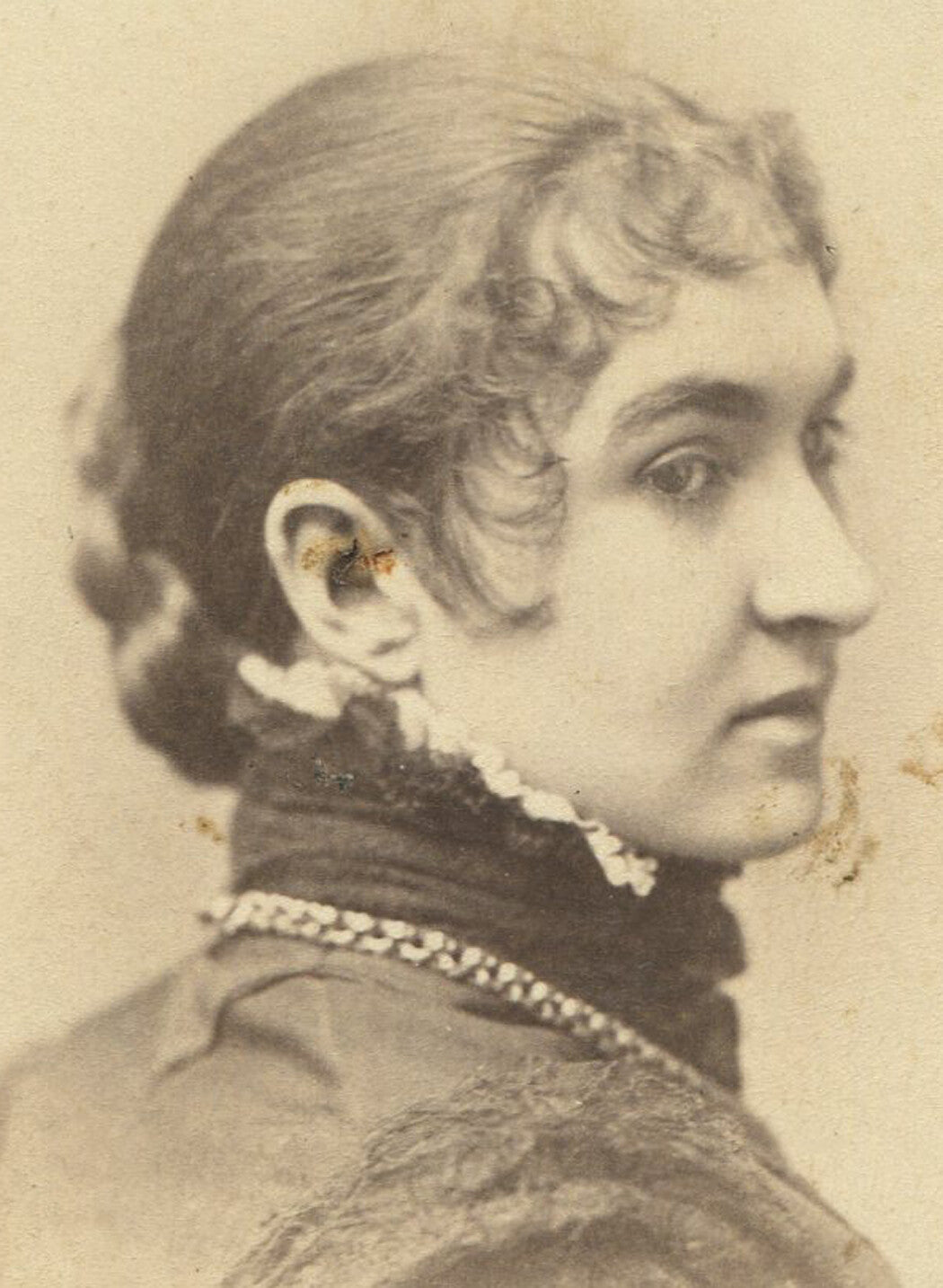 Vintage cabinet card photograph: Woman with pin curls, dramatic profile portrait, collectible