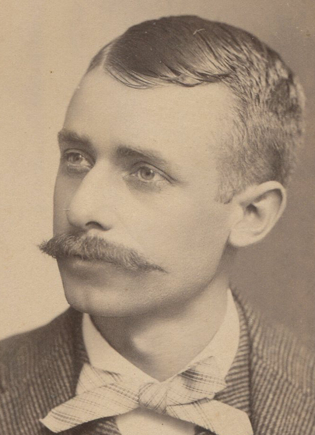 Vintage cabinet card portrait: mustached man with bow tie, Columbus, Ohio photograph, early 20th century