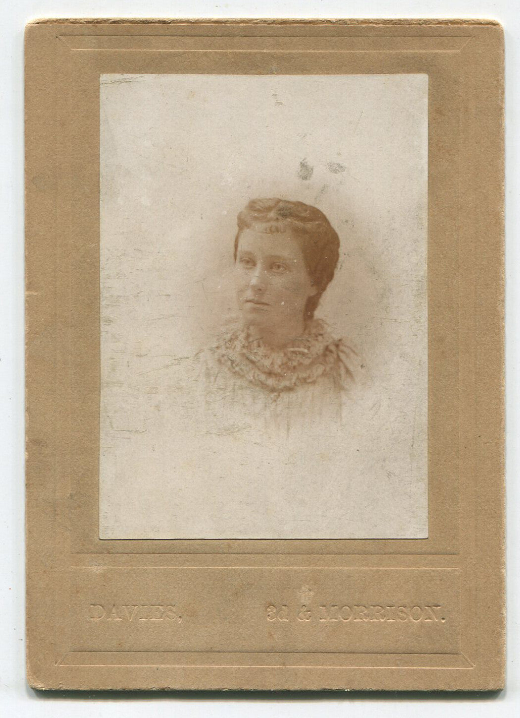 WOMAN W/UNFORTUNATE HAIR STYLE AND DRESS COLLAR.