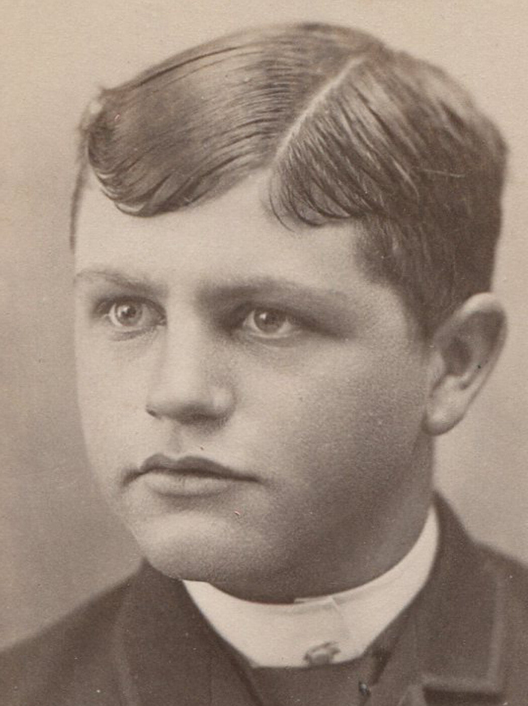 Vintage Cabinet Card Portrait: Round-faced Boy with Intense Expression, Detroit MI, 19th-Century Photo