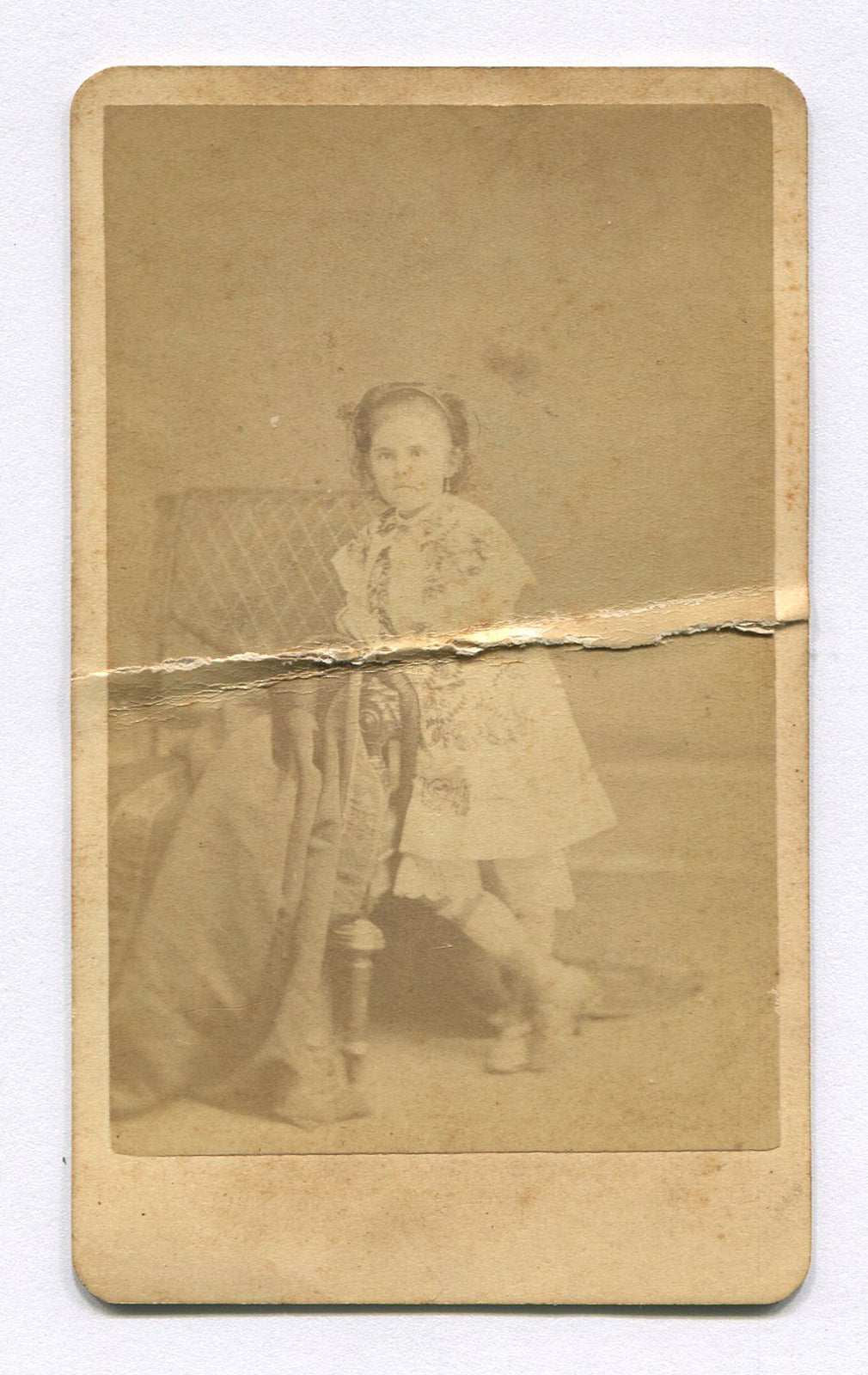 YOUNG GIRL LEANING ON CHAIR. CDV. PROVIDENCE, R.I.