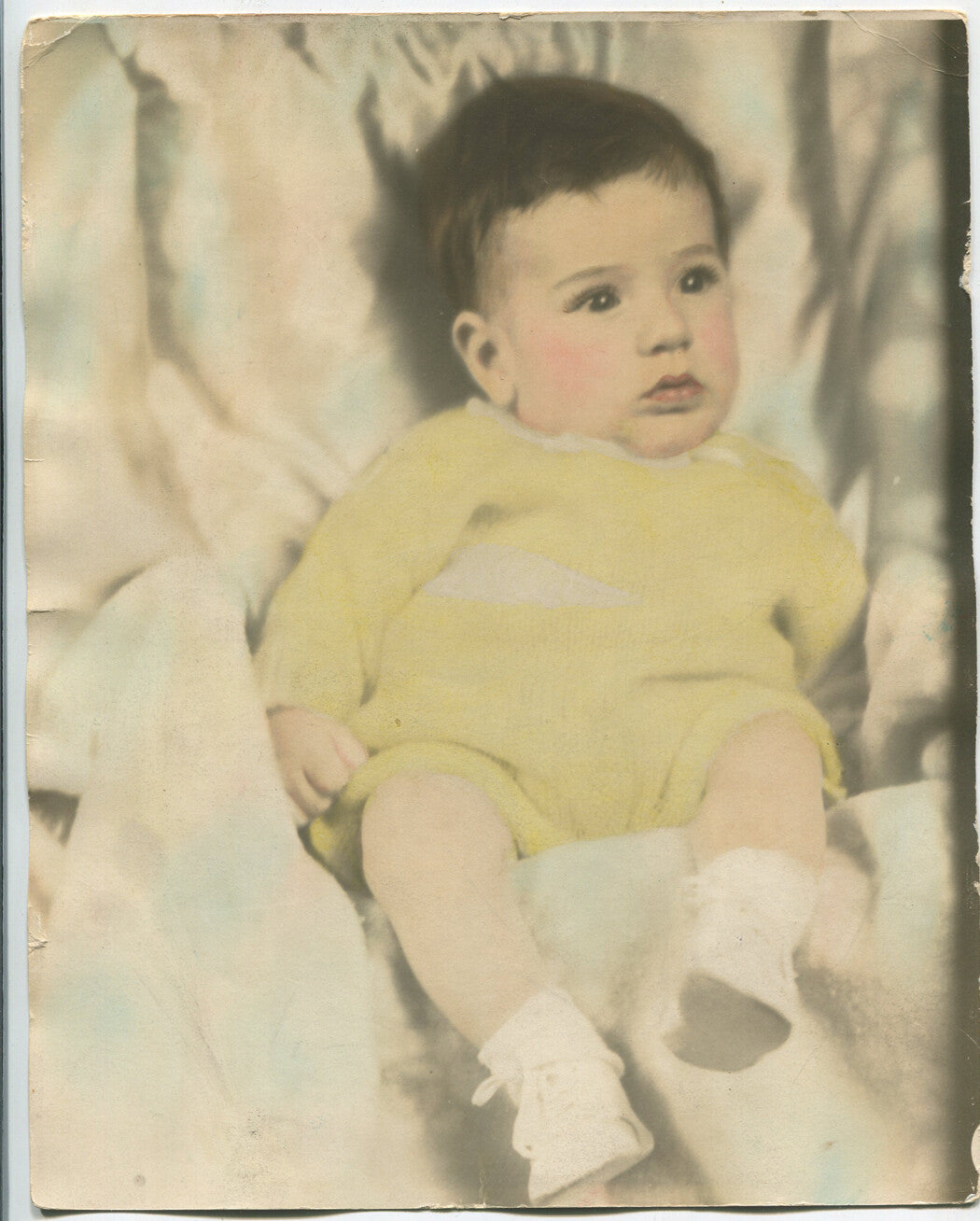 PRETTY EYED BABY. HAND TINTED 8 X 10 SILVER PRINT. 1950s.