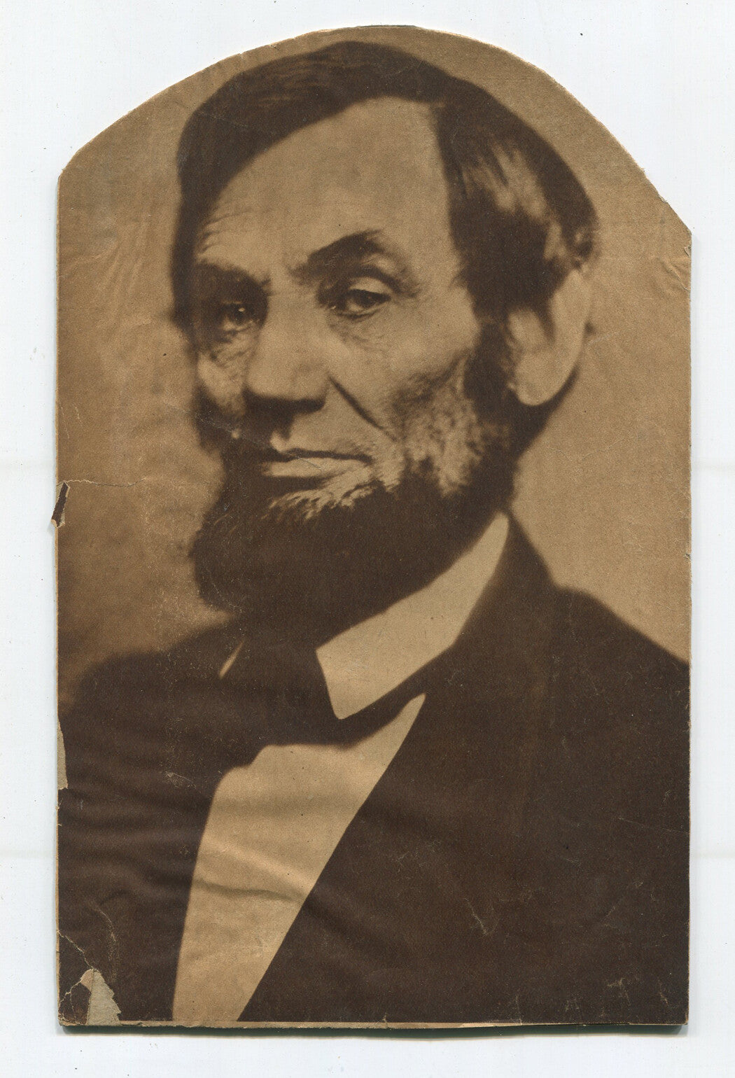 ABRAHAM LINCOLN, CLIPPED PHOTO LITHOGRAPH. 9 X 5.5. INCHES.