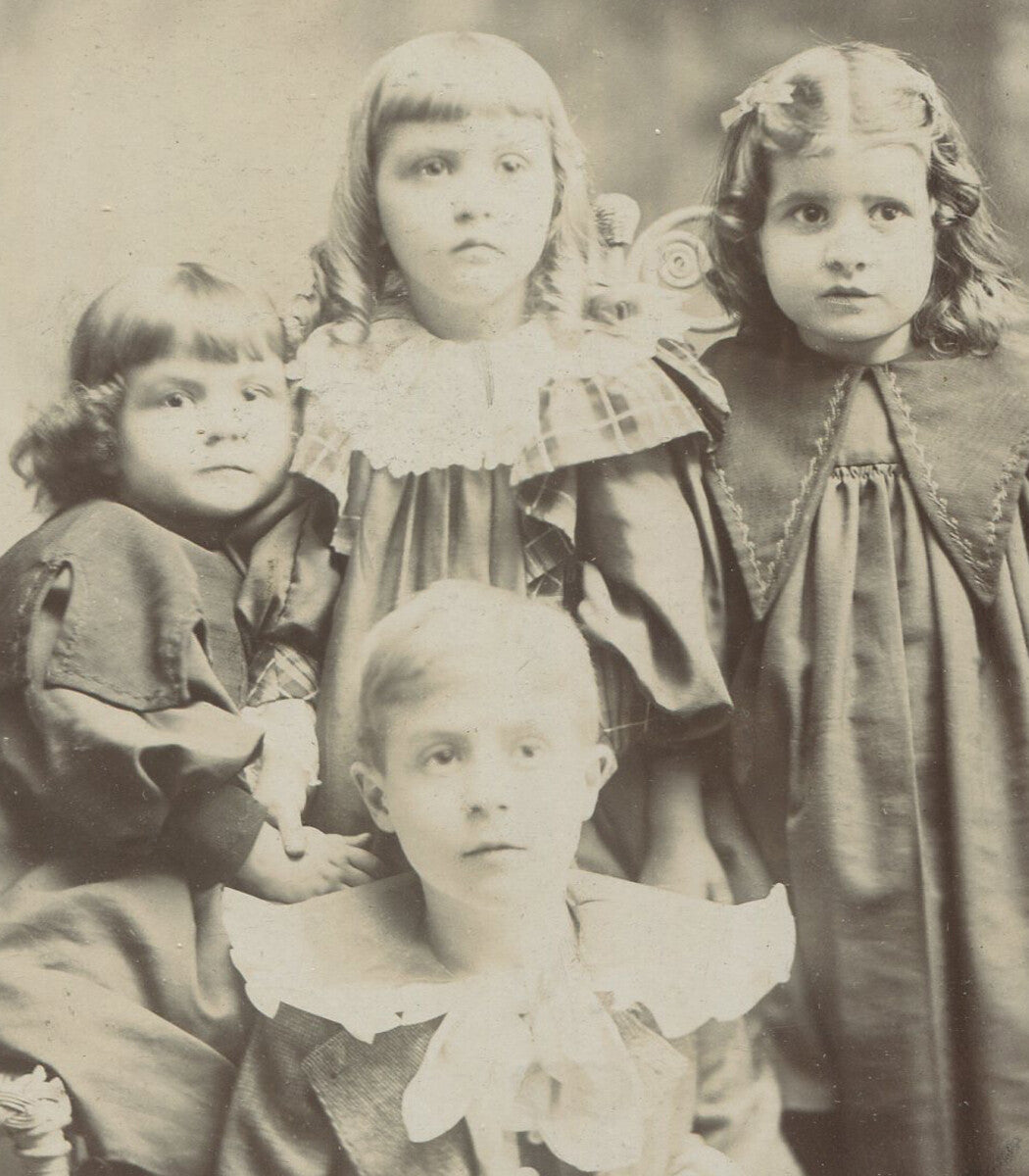 YOUNG BOY OVERWHELMED BY 3 SISTERS. CABINET CARD. SPRINGFIELD, ILL.