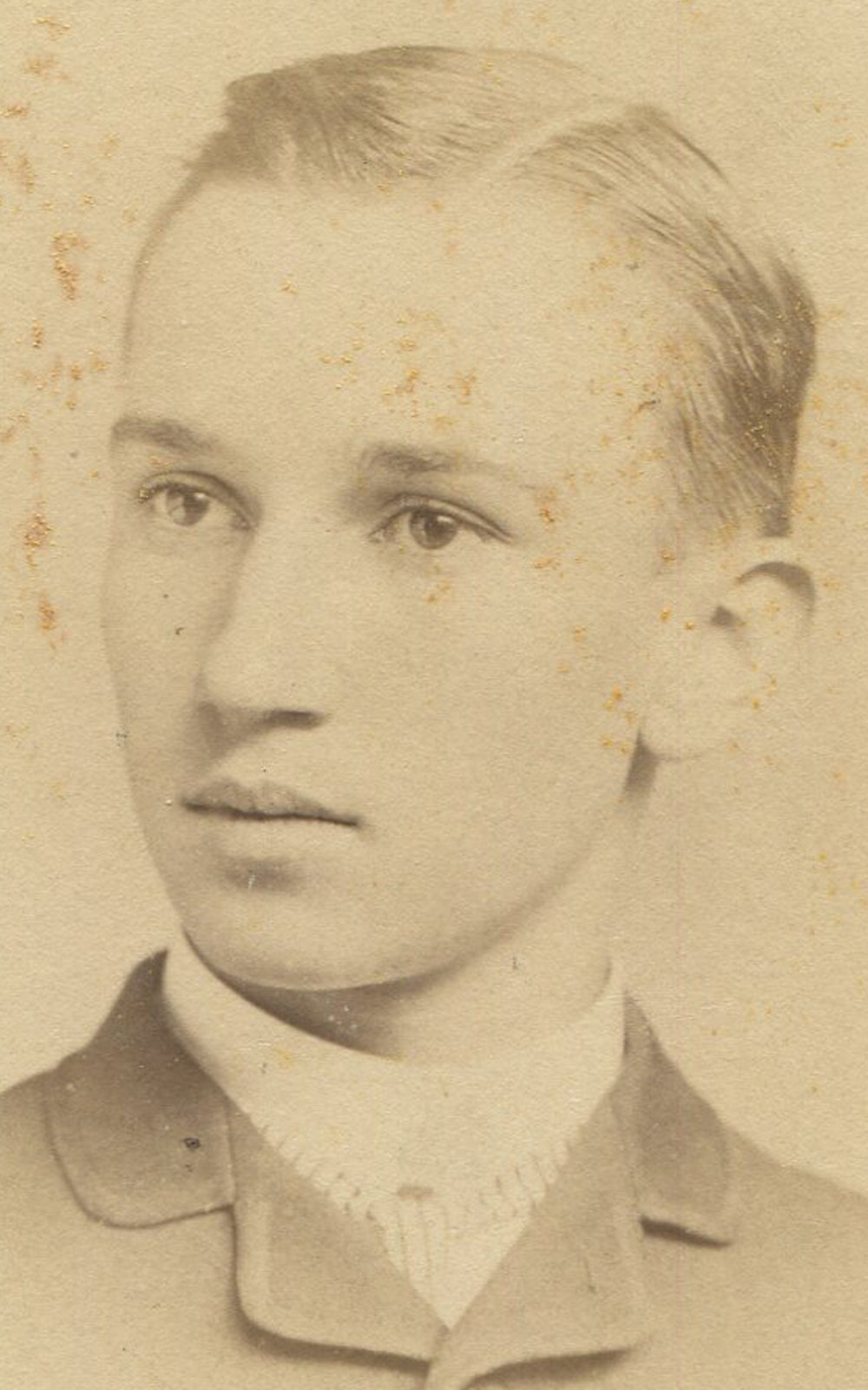 YOUNG MAN WITH THIN SLICKED BACK HAIR. CABINET CARD.