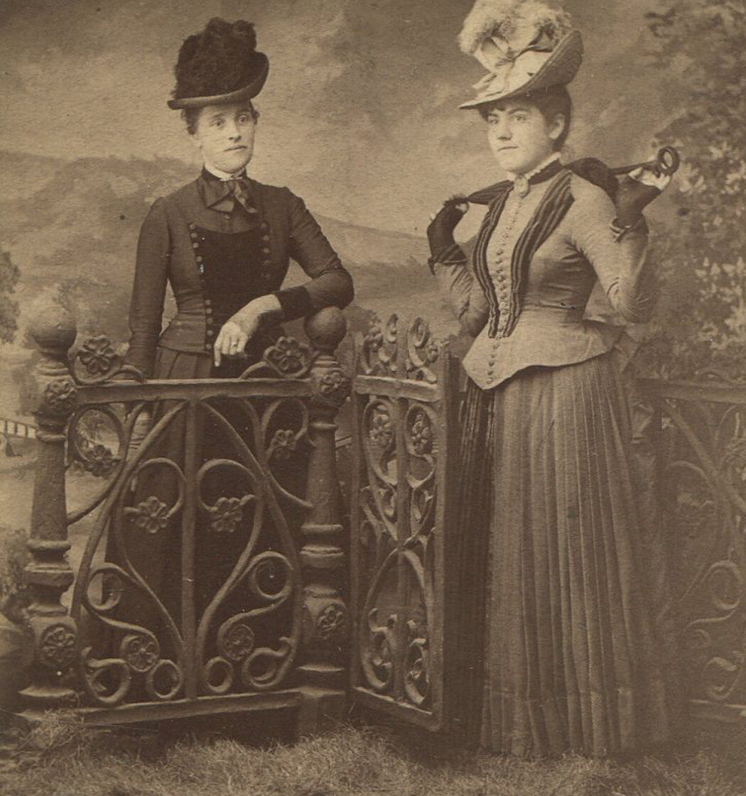 VERY FASHIONABLE WOMEN, HATS, DRESSES AND UMBRELLAS. LA CROSSE, WIS.