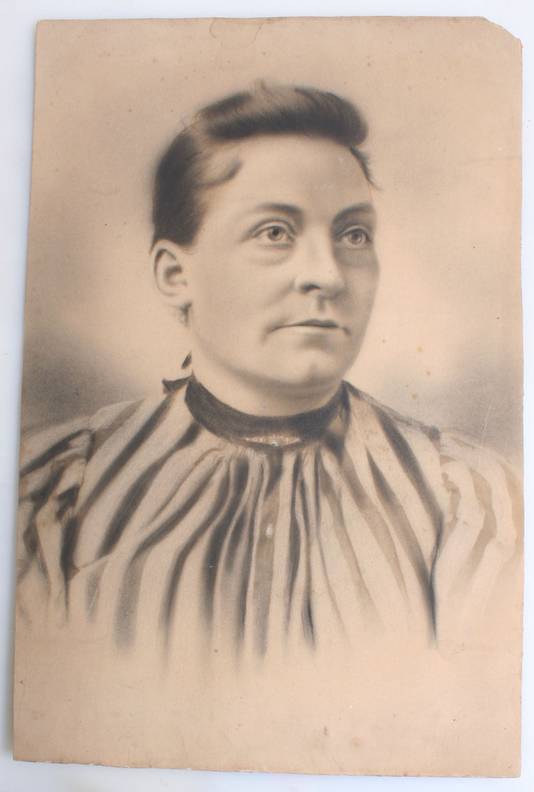 WOMAN WITH BIG EYES AND STRIPED DRESS. SALT PRINT, HAND TINTED. 18 X 12 INCHES.