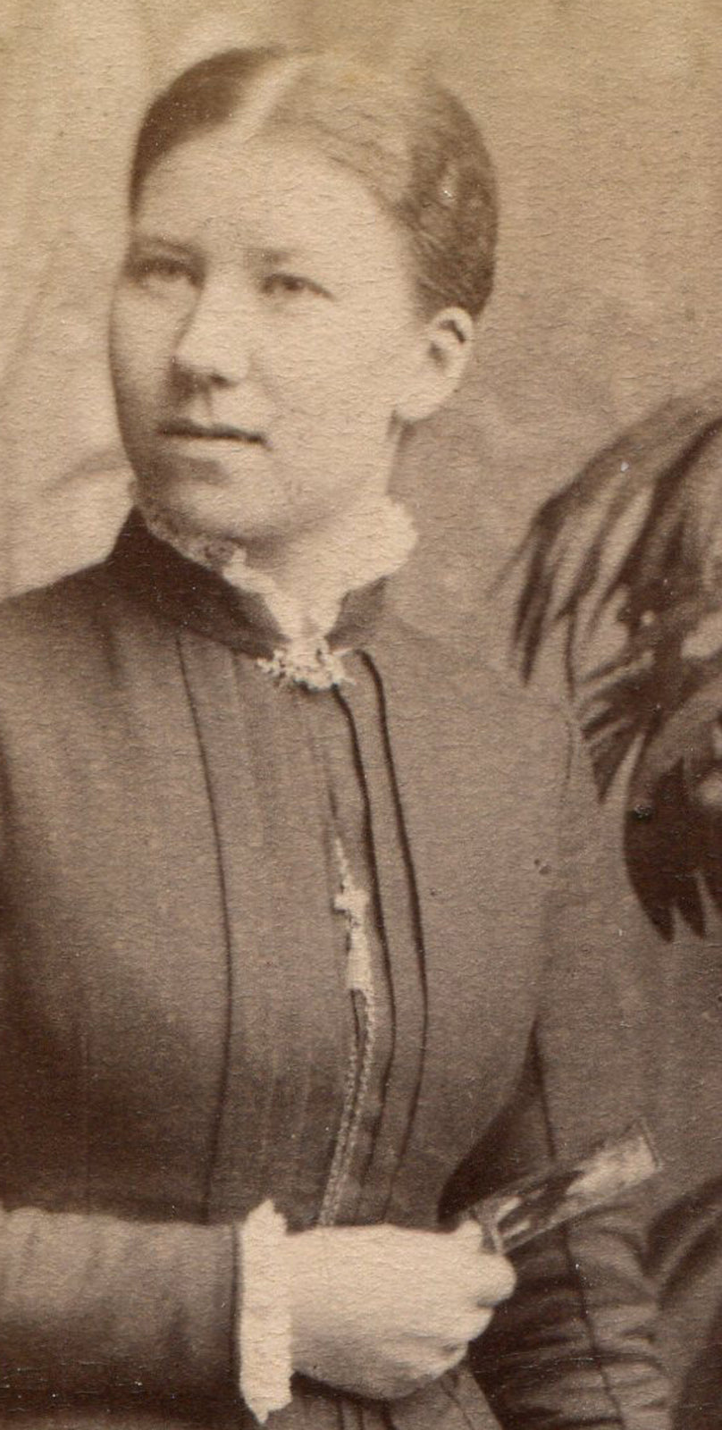 WOMAN, MYSTERY SMILE, HOLDING MYSTERY OBJECT. CDV. STOCKHOLM, SWEDEN.