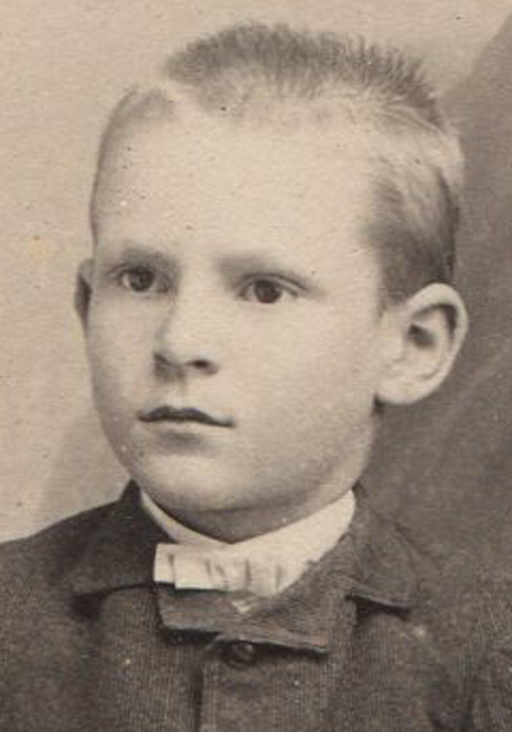 BOY, RELAXED POSE, SPIKED HAIR. CABINET CARD. NEWBURGH, N.Y.