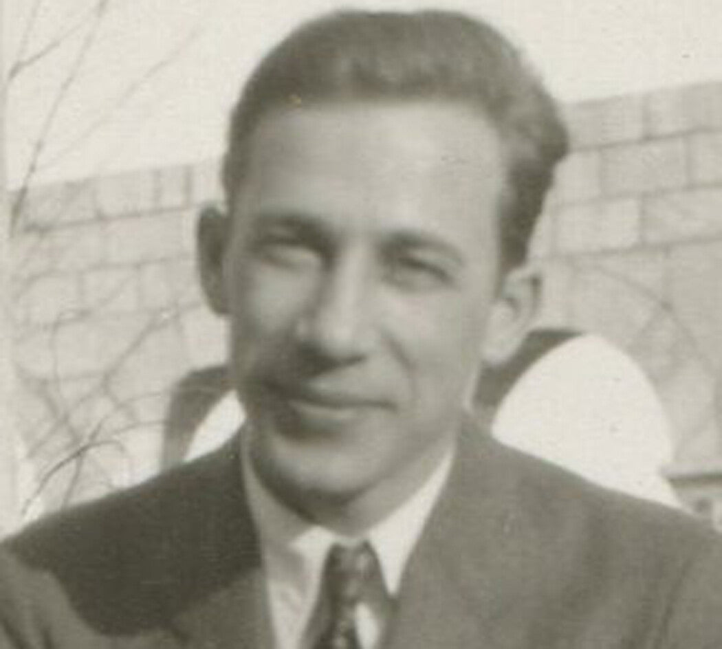 Vintage photo: smiling young man seated in Roman setting, circa 1920, silver print 4.5x3.5 in, original