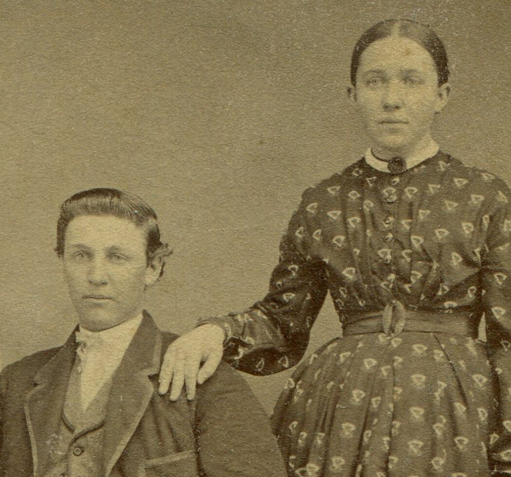 WOMAN MAKING SURE MAN STAYS PUT, HAND ON SHOULDER. CDV.