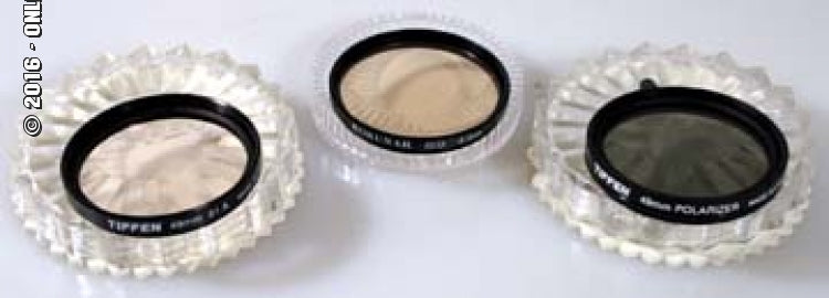 SET OF 3 49MM FILTERS W/ CASES