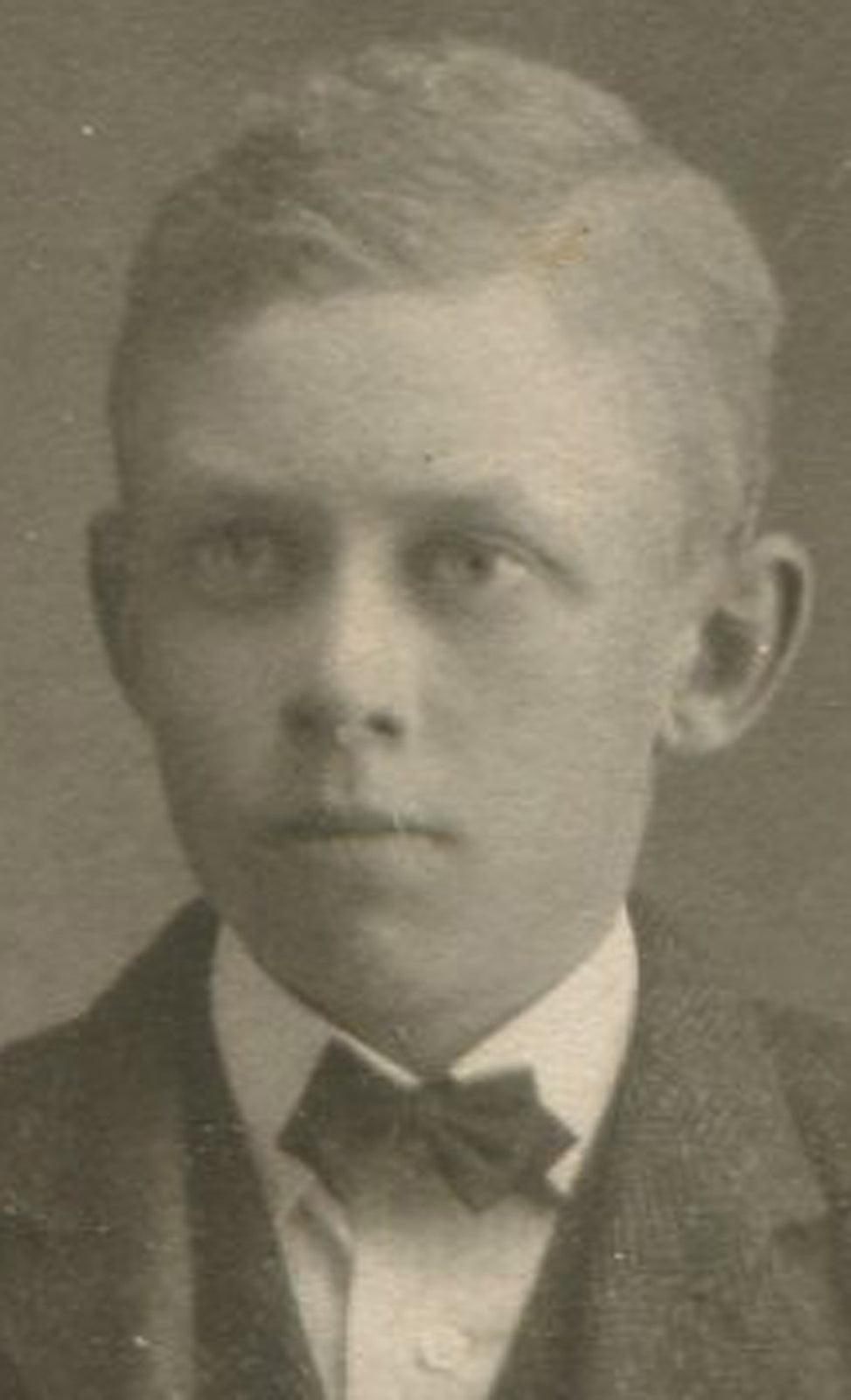 BOY IN KNICKERS, THUMB IN COAT POCKET. 5.5 X 3.75 INCH PHOTO.