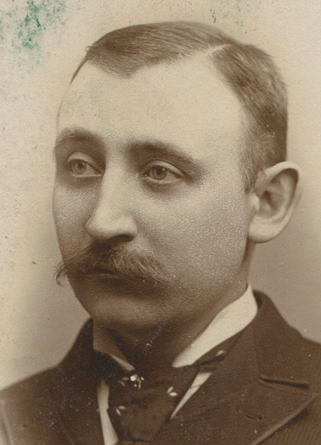 Vintage cabinet card portrait of sad-eyed man with mustache, original old photo