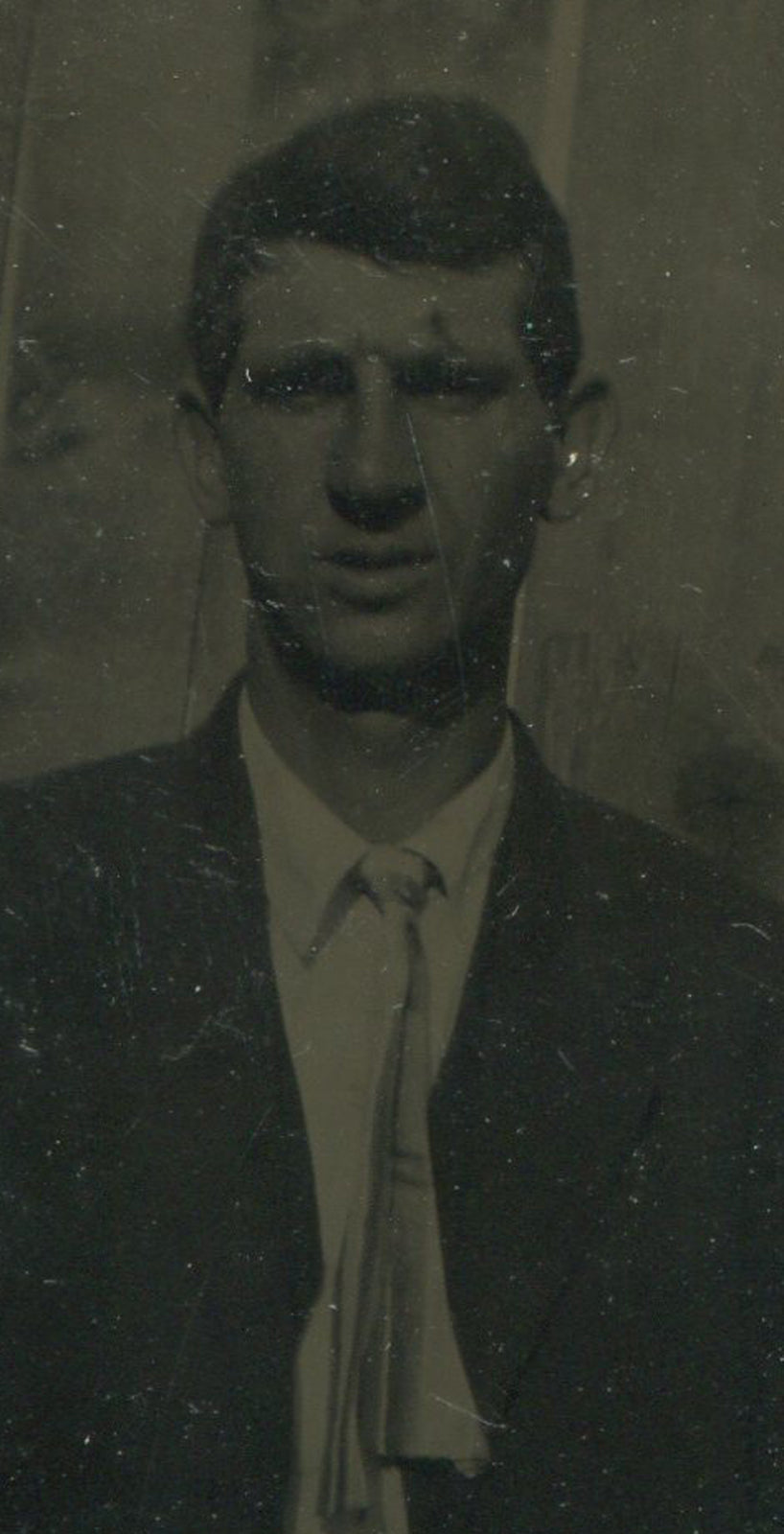 MAN IN LONG SKINNY TIE. TINTYPE IN PERIOD PAPER MAT.