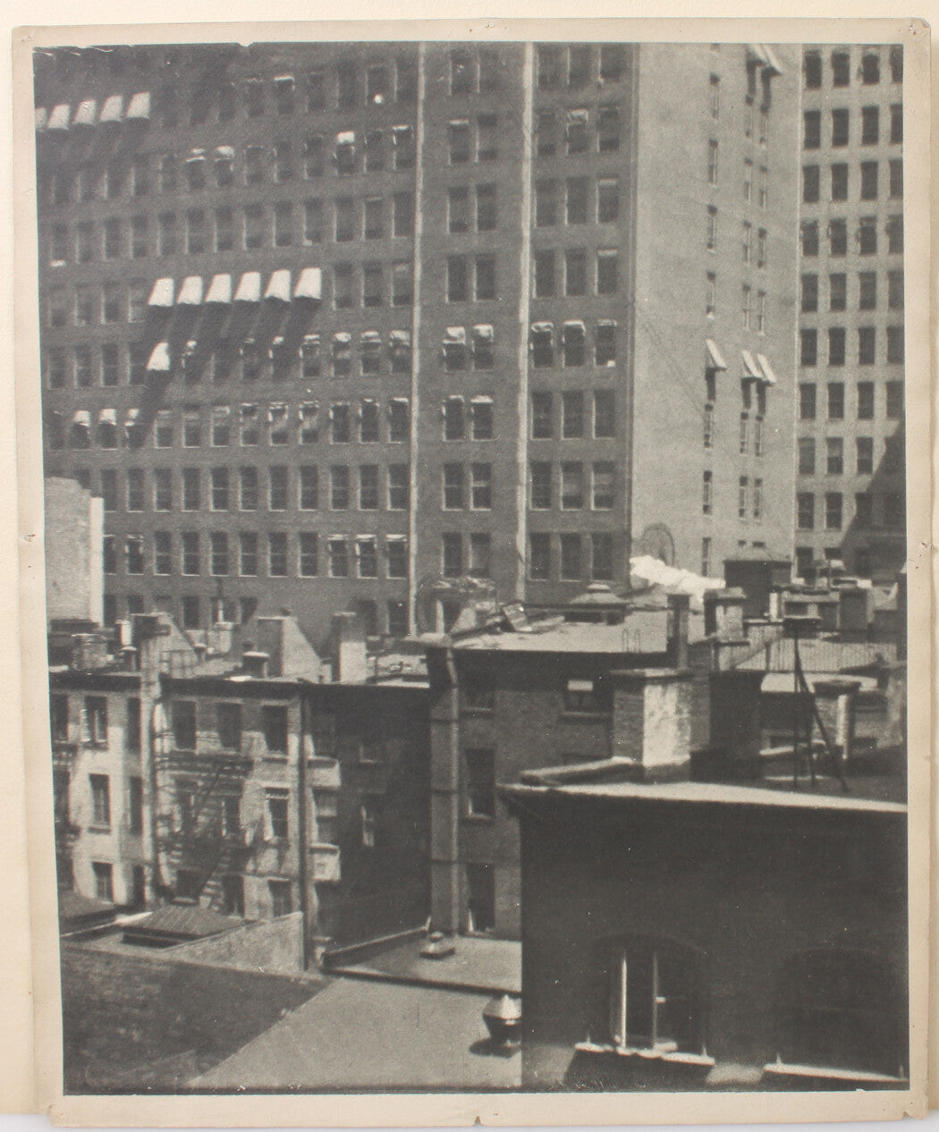 ARCHITECTURAL CHAOS, A JUMBLE OF BUILDINGS. 17 X 14 INCH SILVER PRINT.