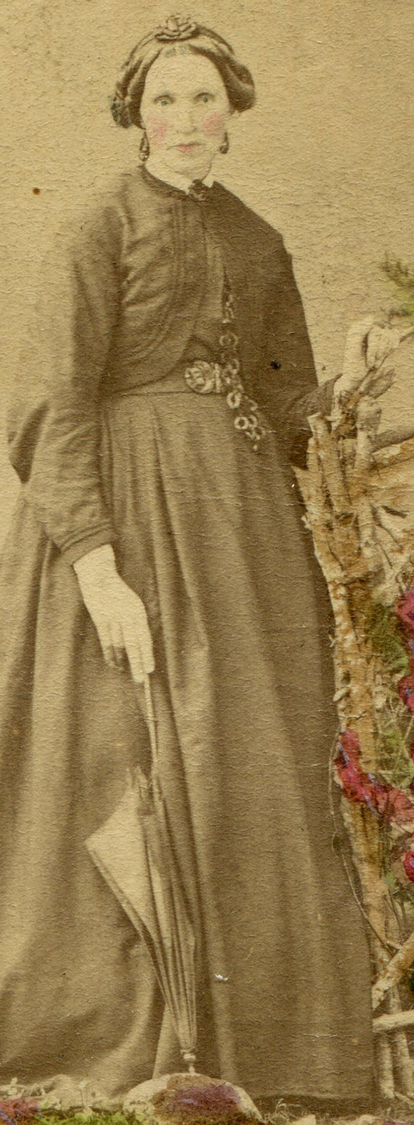 WOMAN HOLDING UMBRELLA, STANDING POSE. TINTED CDV.