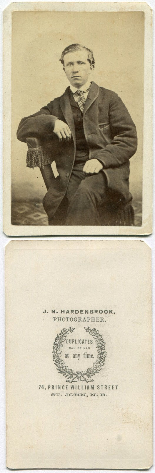 MAN, PLAID TIE, LOOSE FITTING SUIT. CDV. ST. JOHN, NEW BRUNSWICK, CANADA.