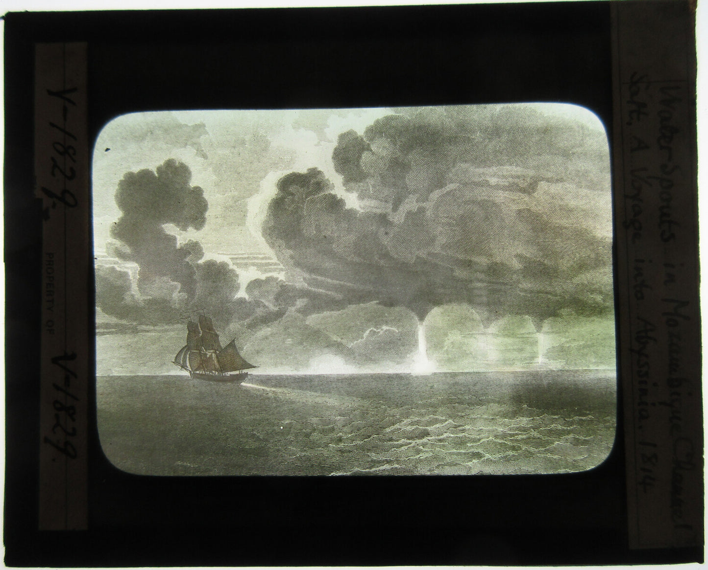 WATER SPOUTS, MOZAMBIQUE. LITHO ARTWORK ON LANTERN SLIDE.