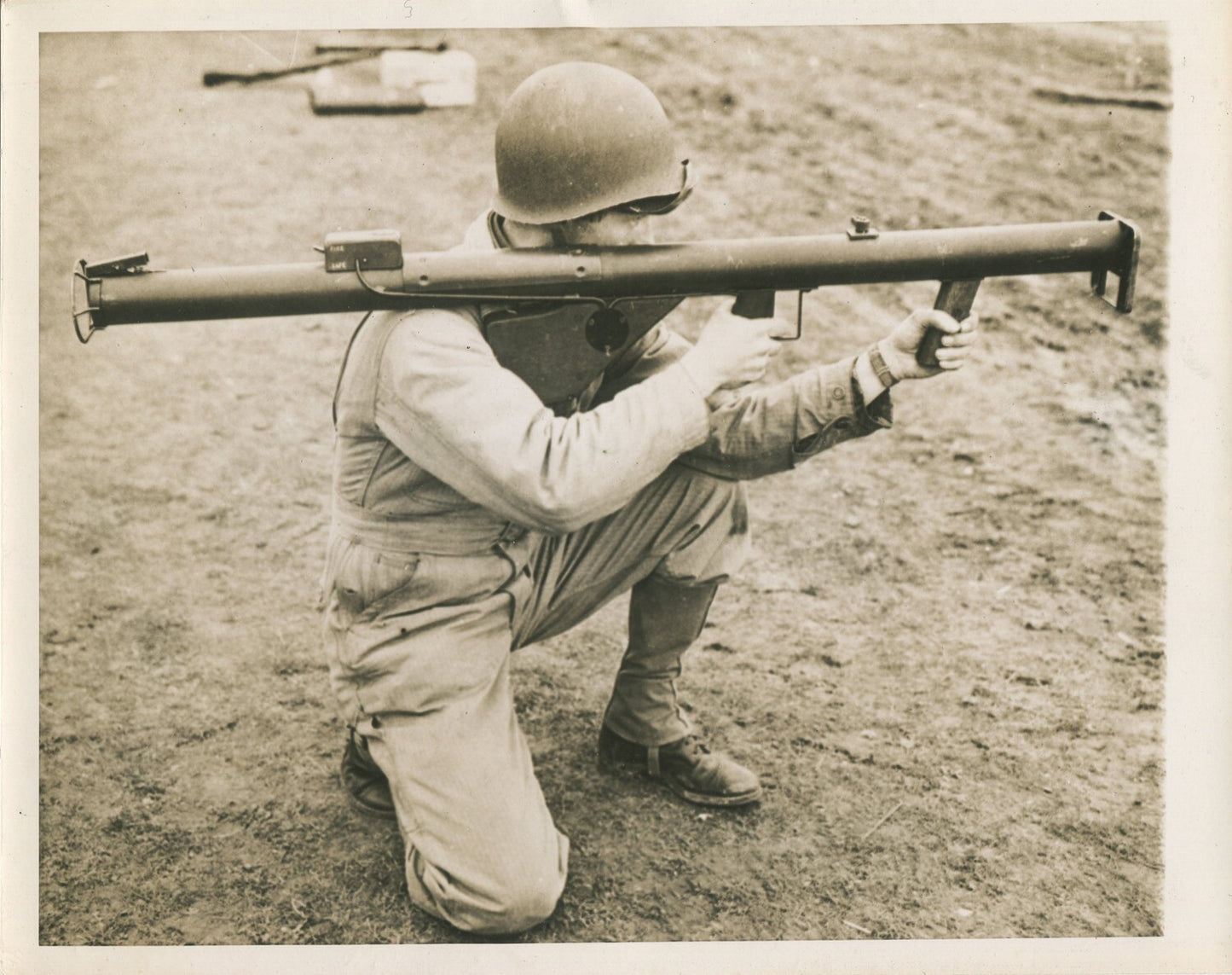 U.S. SOLDIER AIMING SHOULDER HELD WEAPON. WWII. (8X10 REPRINT)