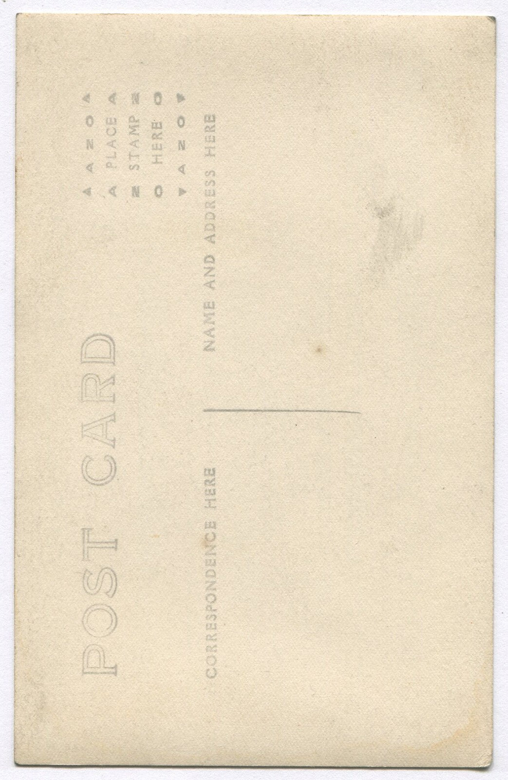 WWI ERA SOLDIER IN UNIFORM PHOTO POSTCARD.