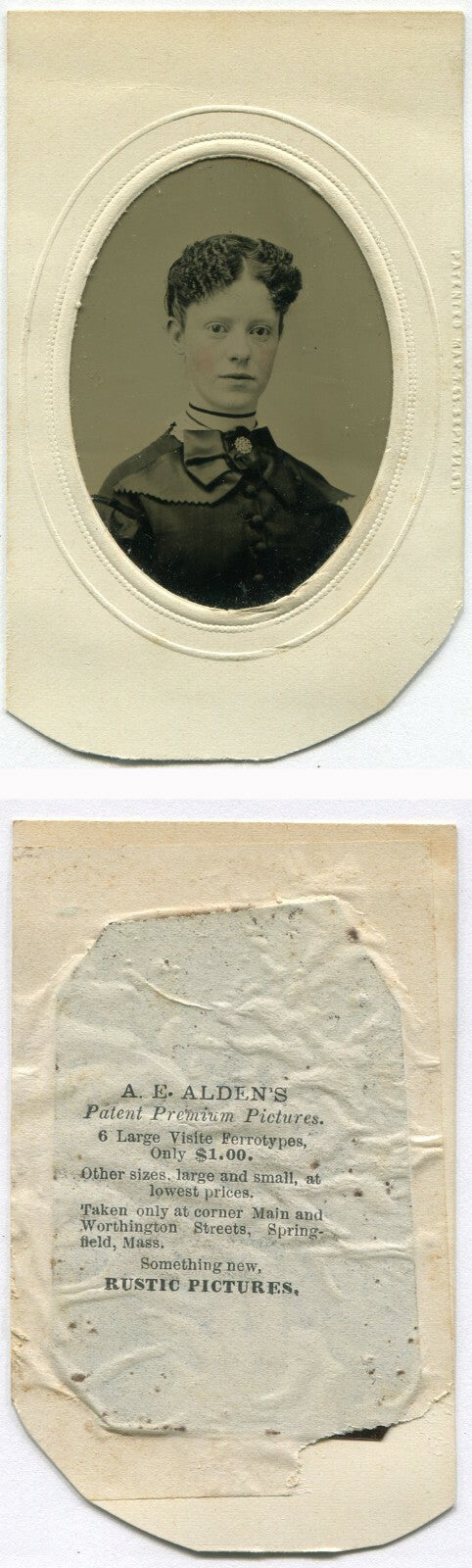 YOUNG WOMAN W/VERY TIGHTLY CURLED HAIR. TINTED TINTYPE, PAPER MAT.