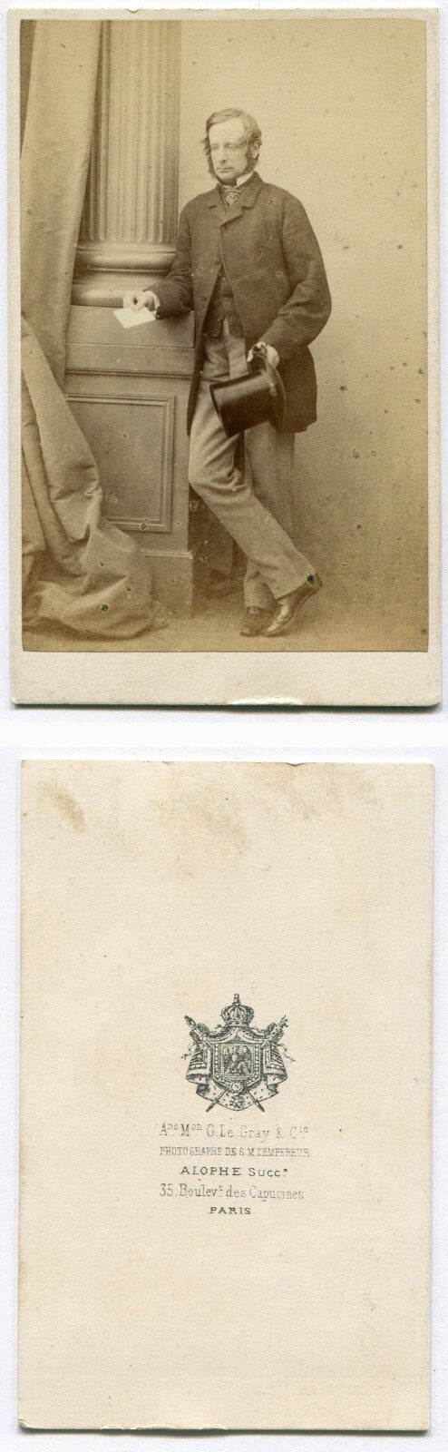 MAN, STANDING POSE, HOLDING TOP HAT, 3/4 LENGTH COAT. CDV. PARIS.