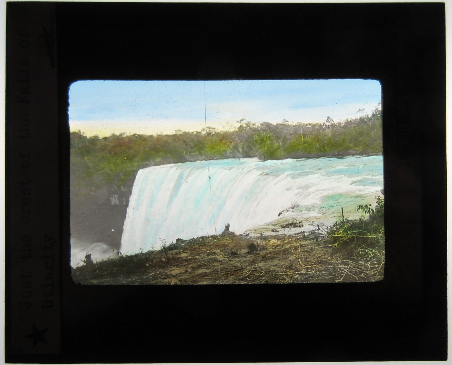 UTIARITY FALLS, BRAZIL. HAND COLORED PHOTO ON GLASS.