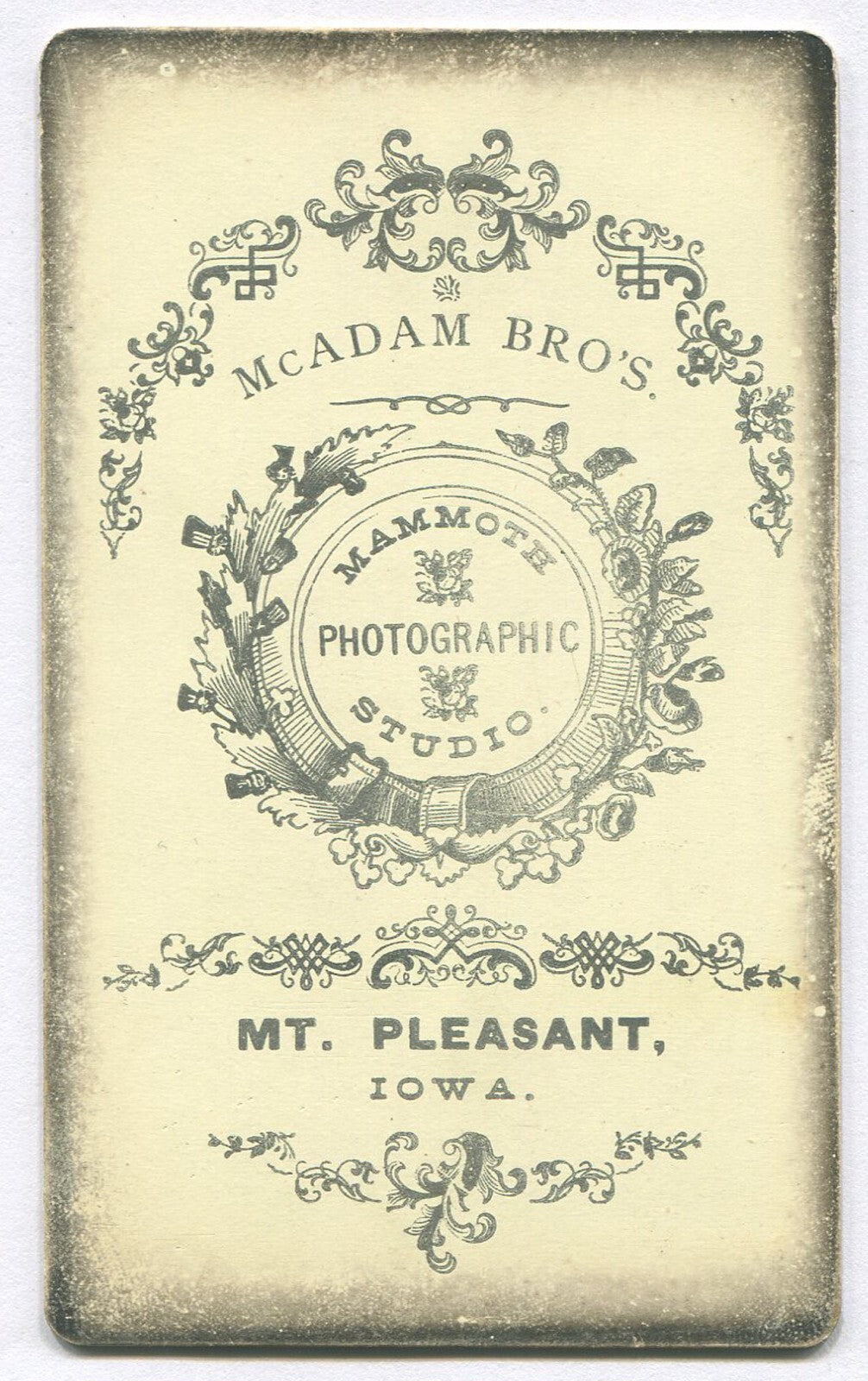 MAN W/MUSTACHE, PLAID SUIT. CDV. MT. PLEASANT, IOWA.