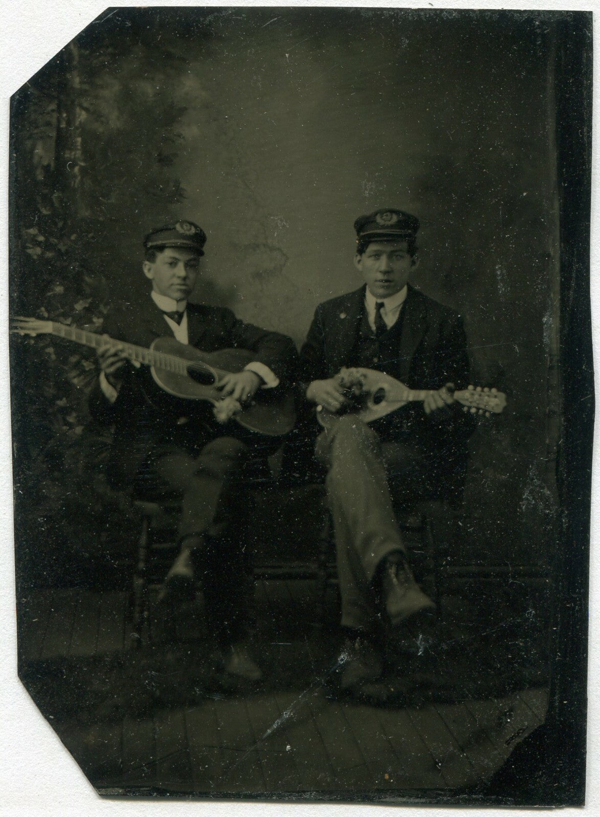 FIREMEN POSED W/MUSICAL INSTRUMENTS. TINTYPE.