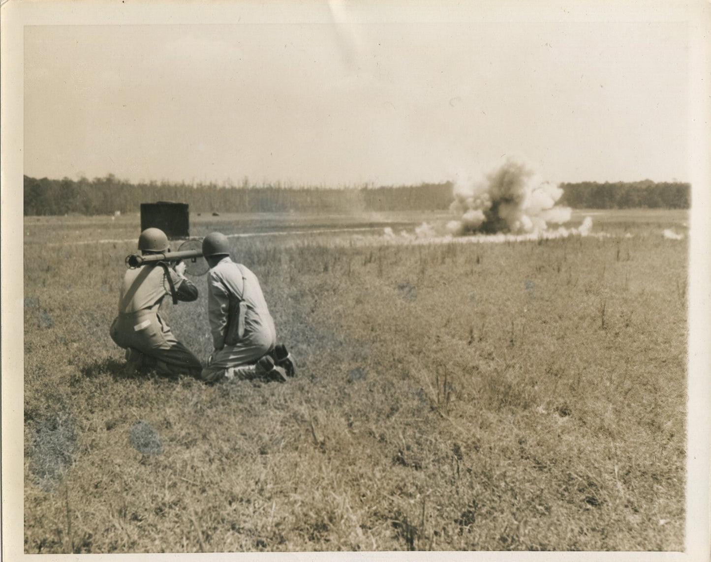 U.S. SOLDIER FIRING SHOULDER HELD WEAPON. WWII. (8X10 REPRINT)