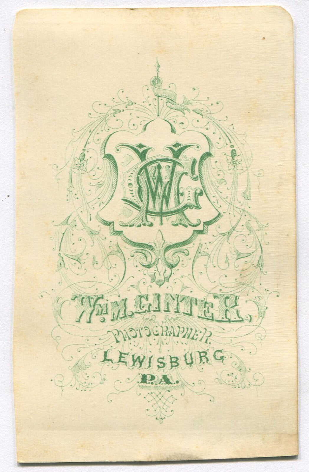 GRUMPY TODDLER SEATED ON ORNATE CHAIR. CDV. LEWISBURG, PA.