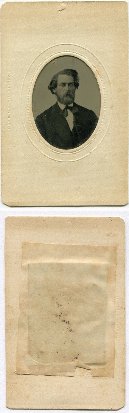 VERY HANDSOME MAN WITH WILD HAIR. TINTED TINTYPE IN PERIOD PAPER MAT.