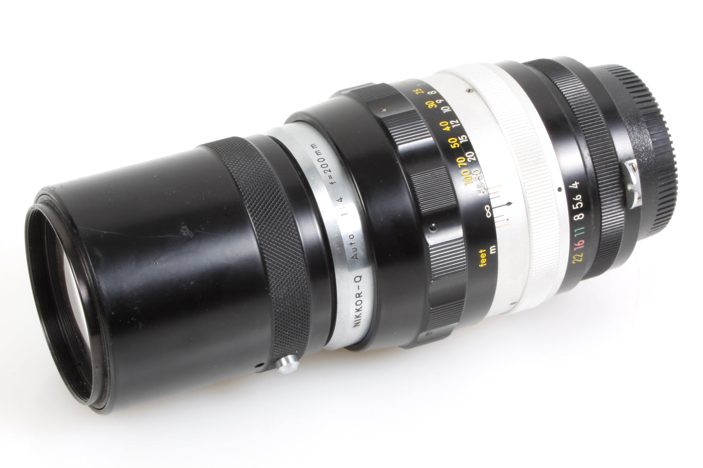 Nikon AI Nikkor 200mm F4 MF Telephoto Lens w Built In Hood & Leather Case