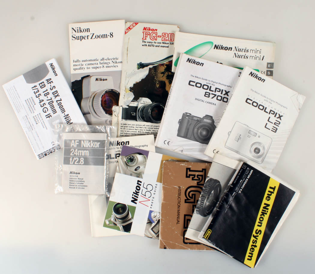 NIKON LITERATURE AND MANUAL COLLECTION, LOT OF 16