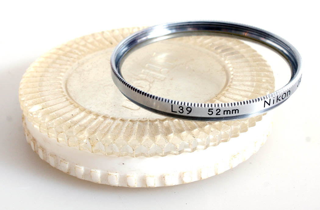 NIKON 52MM L39 FILTER IN CASE